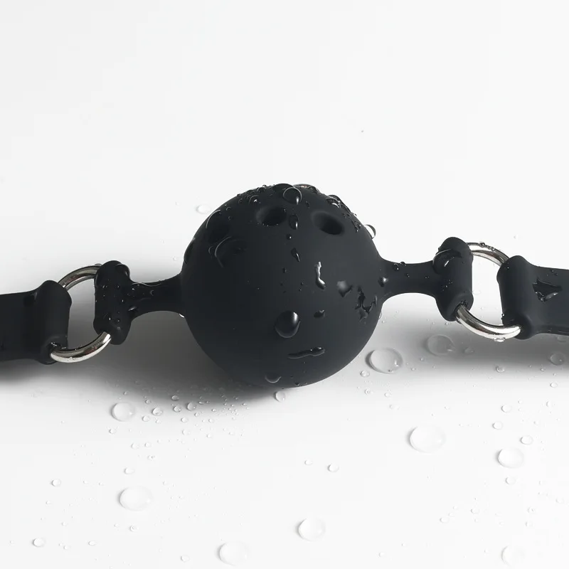 Soft silicone accessory shown with water droplets and smooth rounded shape