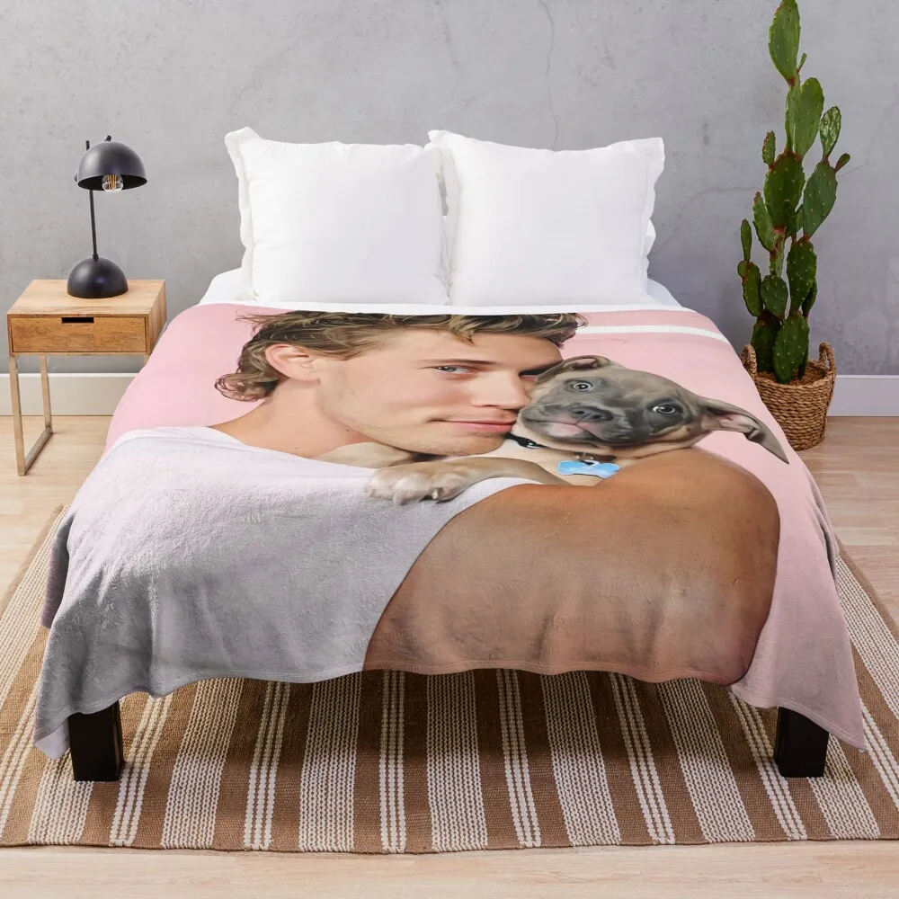 

austin butler hugs a dog Throw Blanket Plaid on the sofa Tourist Blanket