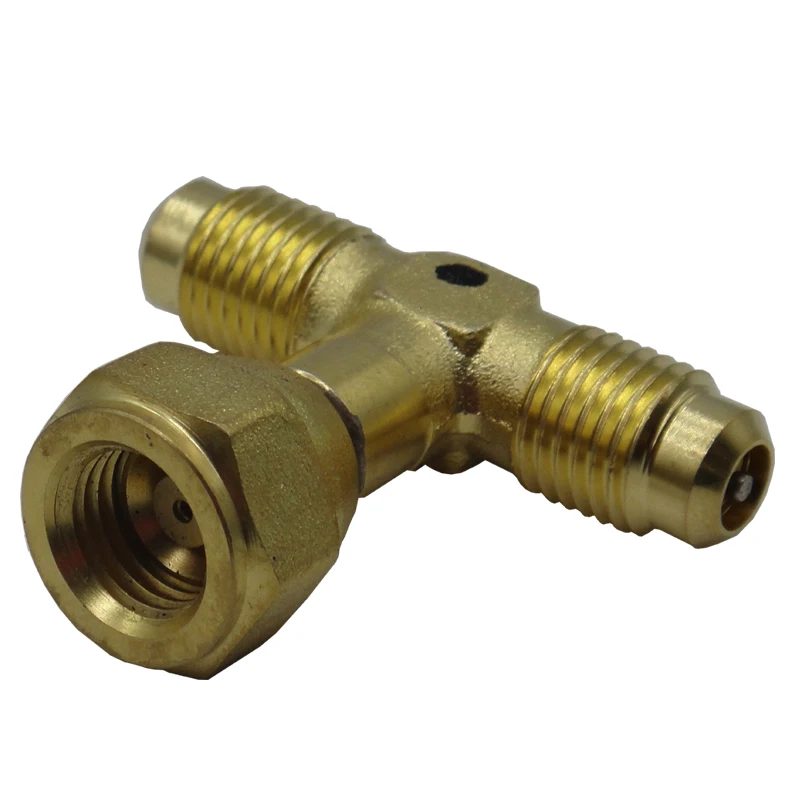 Schrader adapter between 1/8" NPT and 1/4" SAE is used to access screw compressor body to sensor high and low pressure