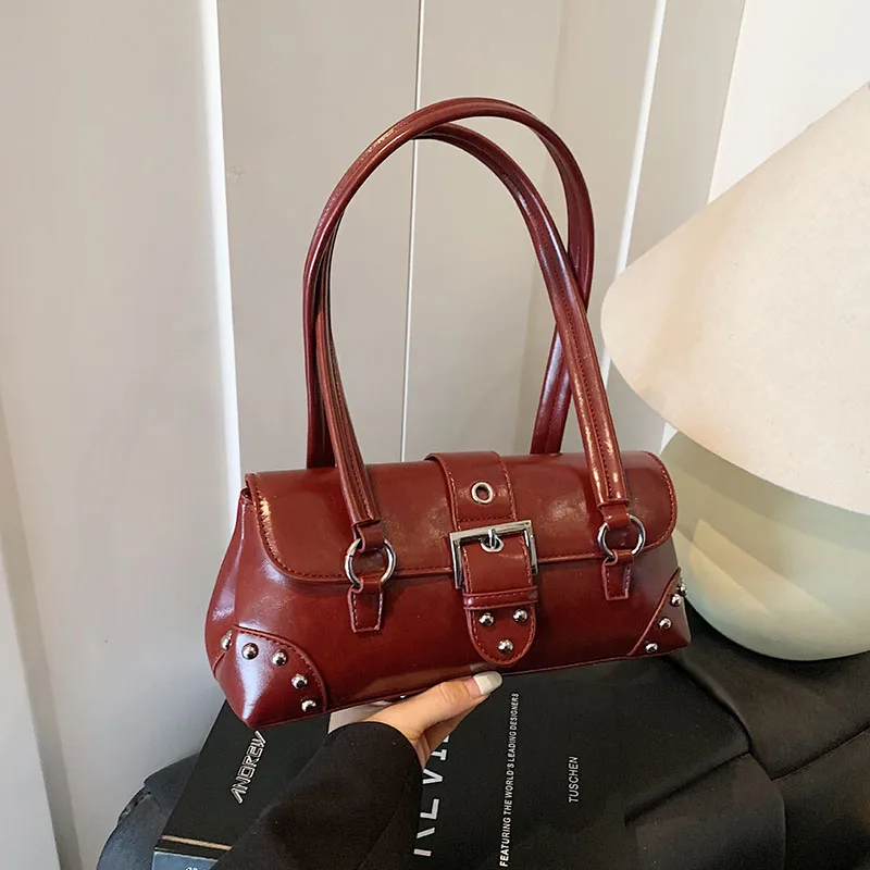 Autumn And Winter New Retro Motorcycle Armpit Bag Casual Rivet Women'S Shoulder Bag Commuting Bag Pu Stick Bag