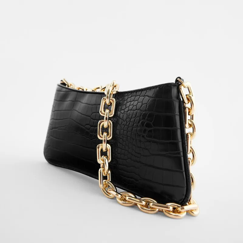 crocodile clutch with gold chain