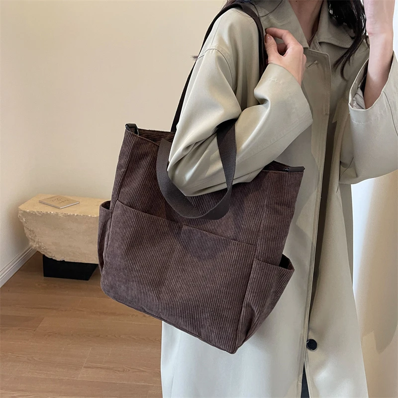 

Fashion Versatile New Women's Canvas Large Capacity Tote Bag Simple Outdoor Leisure Retro Commuter Single Shoulder Storage Bags
