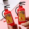 2pcs Funny Mini Fire Extinguisher Toy Water Guns Spray Water Outdoor Pool Beach Summer Toys Fireman Squirters for Kids Party 4