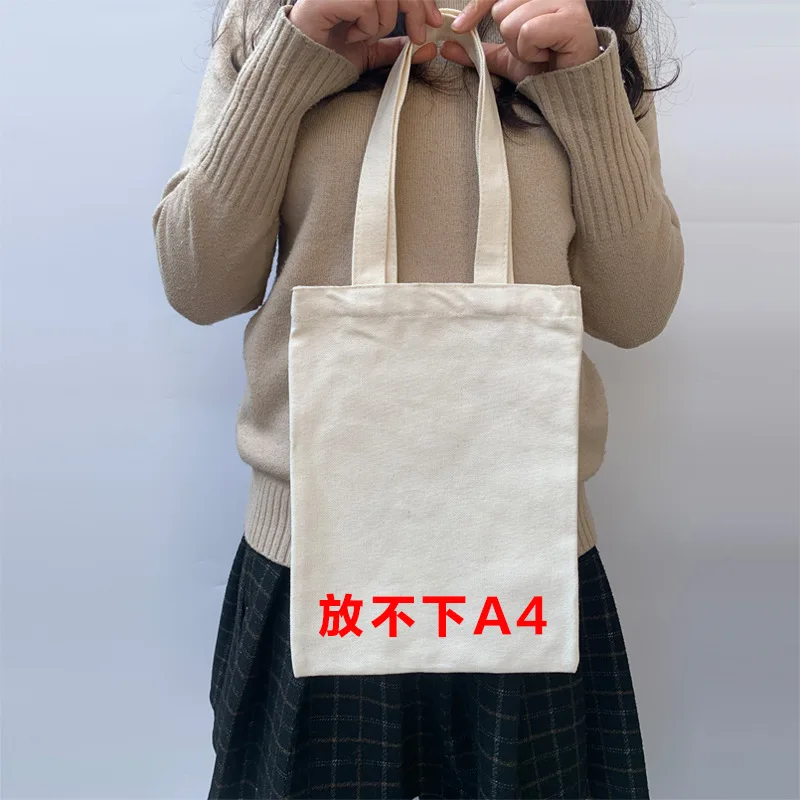 حقيبة قماش بيضاء مطبوعة يدويًا حقيبة يد فارغة مرسومة يدويًا حقيبة حمل قابلة للتخصيص مع شعار حقيبة قماش فارغة مطبوعة سريعة