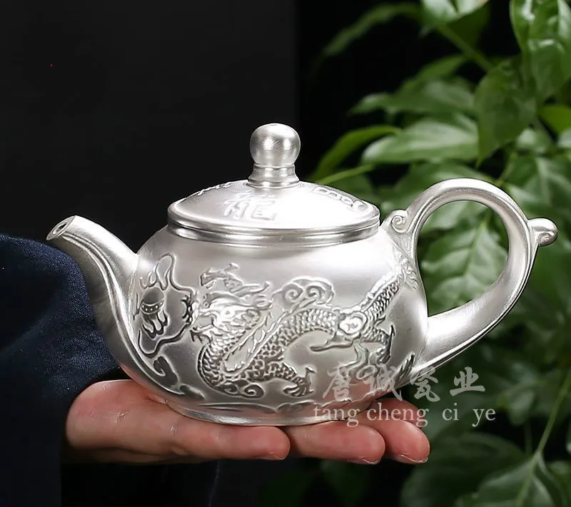 

S999 sterling silver teapot ceramic silver-plated teapot household kung fu tea set filter hole single pot tea maker filter