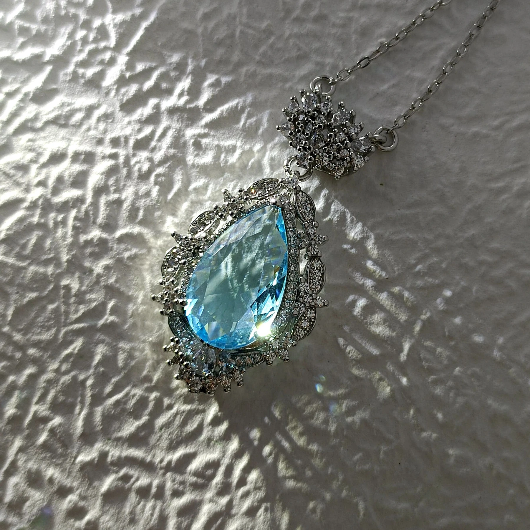 Glamorous Silver Tone Art Deco Ornate Cluster Halo Blue Pear Drop Pendant Necklace Ethereal Jewelry