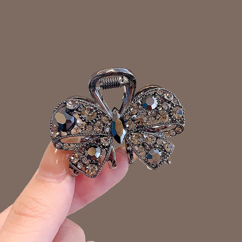 Exquisite hohle Schleife Haarnadel neue Strass kleine Grabber Mädchen süße Pony Clip Seite Clip süße Haarspange
