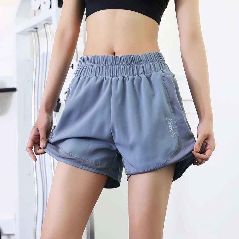 Quick drying shorts anti naked running training outdoor vacation two pieces of net fitness pocket women's sports shorts