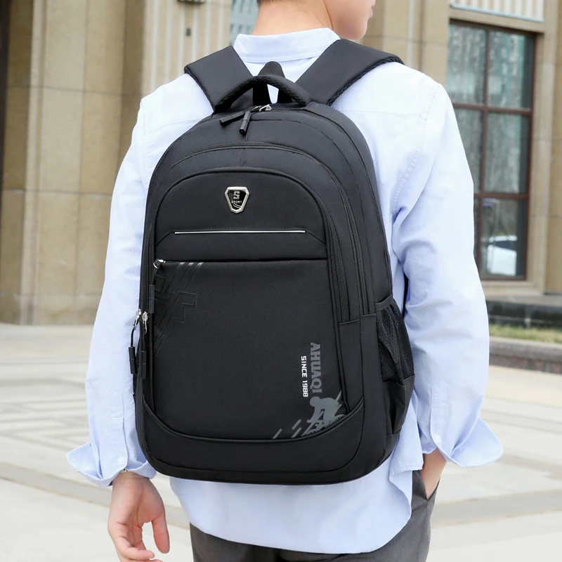 Unisex large-capacity backpack with zippered compartments and padded back panel, made of high-quality and durable polyester, fea