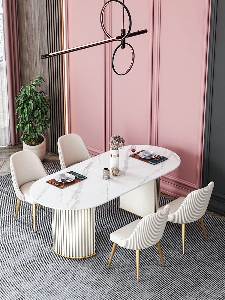 

Rock slab dining table and chairs combined with a small household Internet celebrity style oval dining table