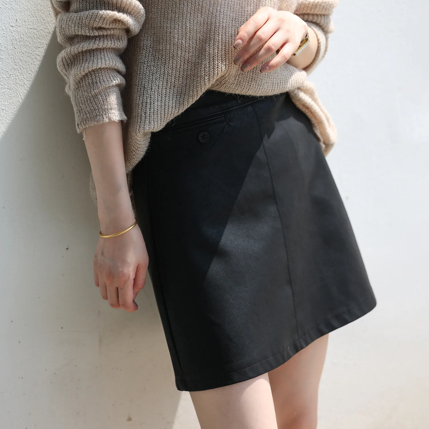 Matte PU leather short skirt for women 2022 Spring New Korean high waist show thin temperament short skirt white tennis skirt