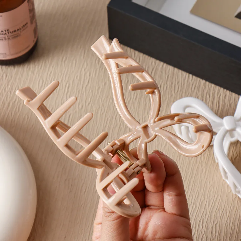Weiche Hai-Clips aus Silikon sind sicher und fortschrittlich. Butterfly-Clips sind bruchsichere und unzerbrechliche Haaraccessoires. – Detail 9