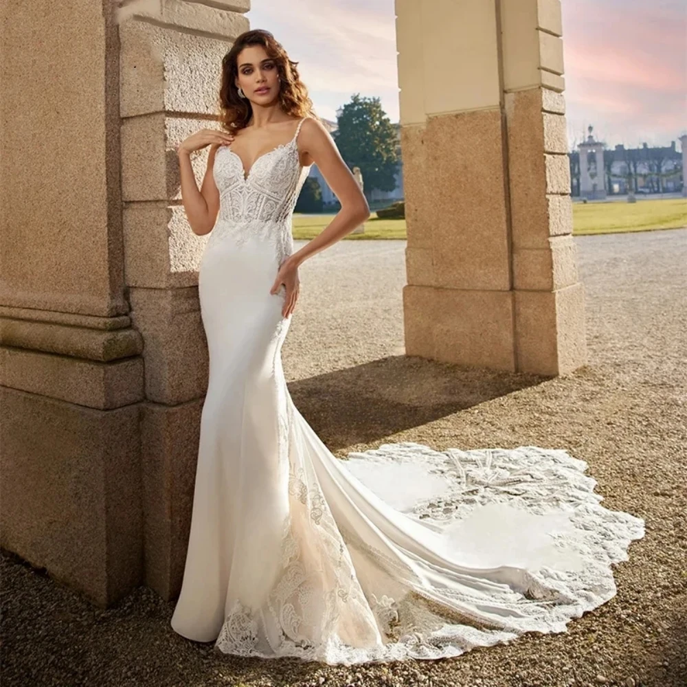 

2024 Elegant Sweethear Neck Mermaid Wedding Dresses Satin Lace Appliques Sexy Backless And Buttons Sleeveless Beach Bridal Gowns
