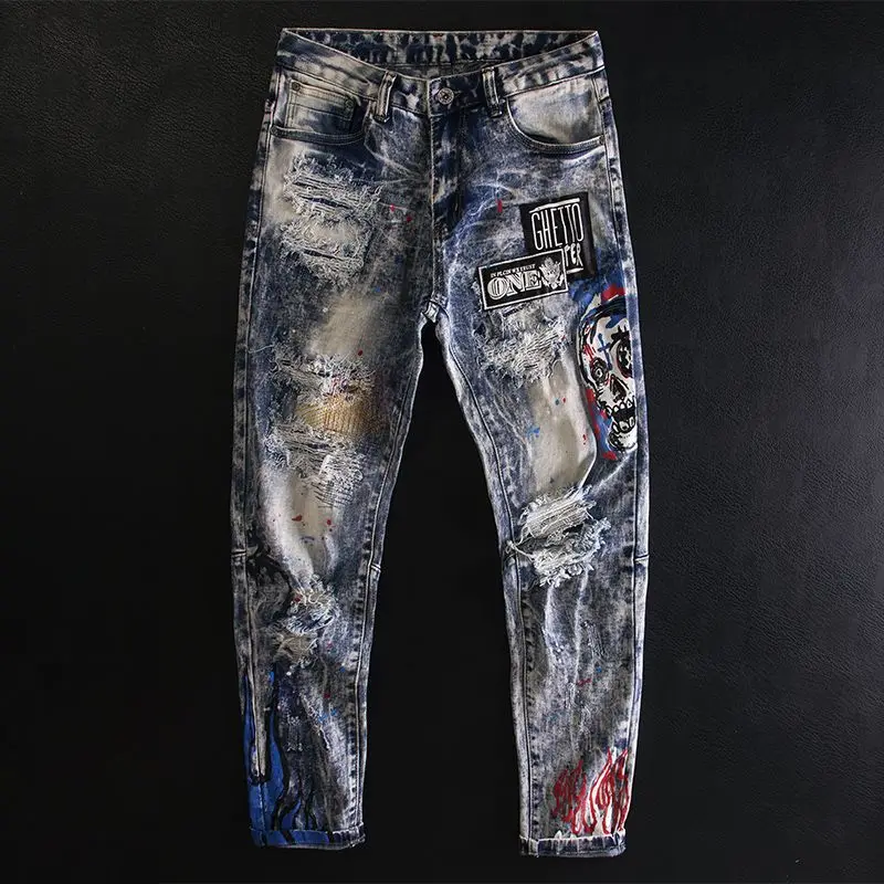

Street hole patch print ink splash jeans men's slim small feet skull splash paint European and American personality pants