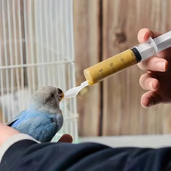 4pcs-Parrot and bird feeding syringe set, with soft spoon, precision manual feeding tool, durable and easy to use 1