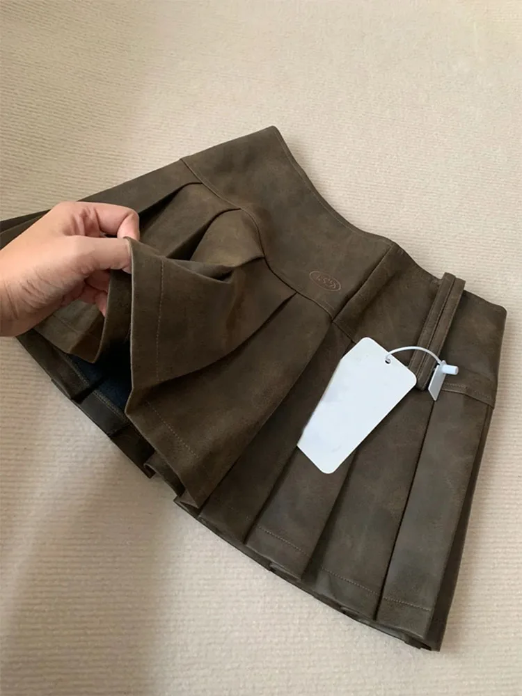 

Юбка-трапеция кожаная в складку, с завышенной талией, в японском стиле