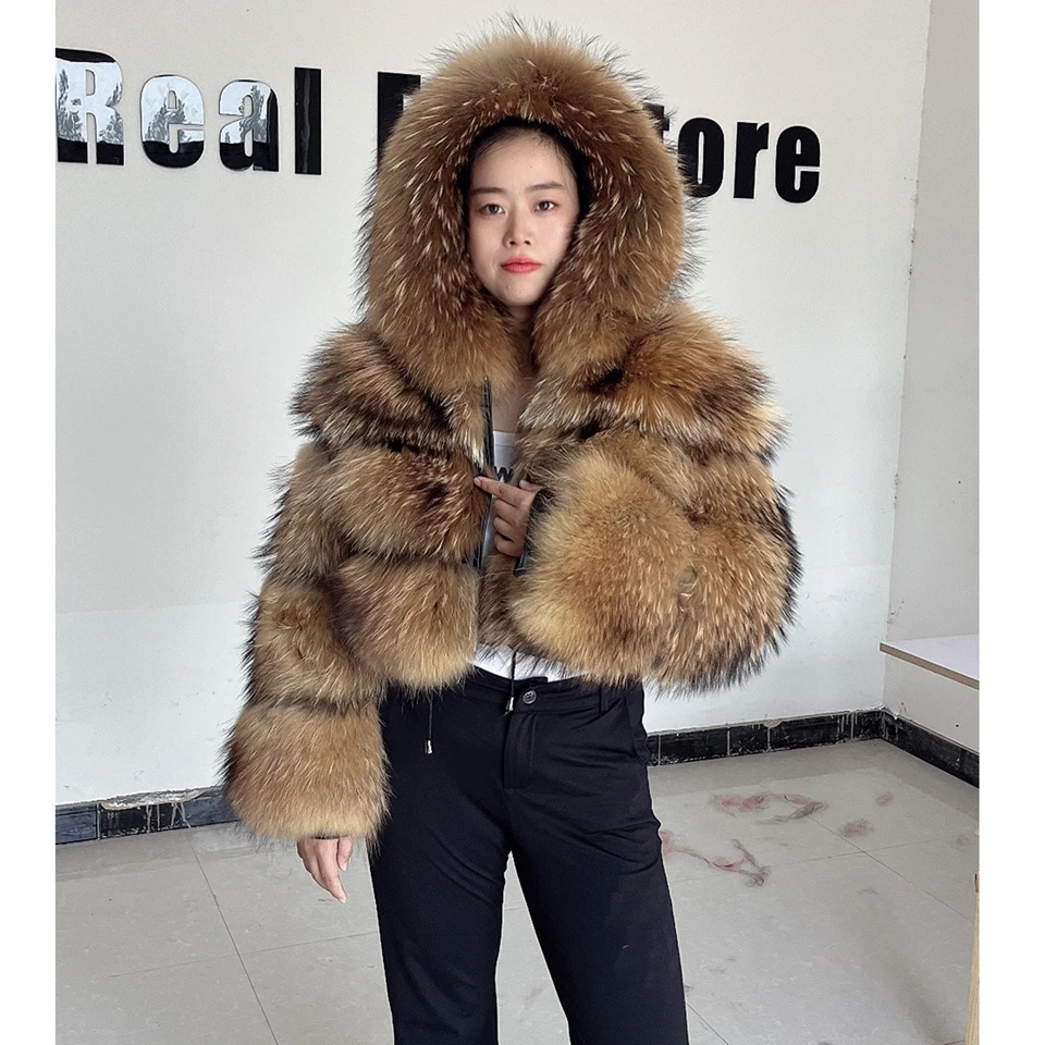 毛皮のコートの女性の冬のファッション天然アライグマの毛皮のコート