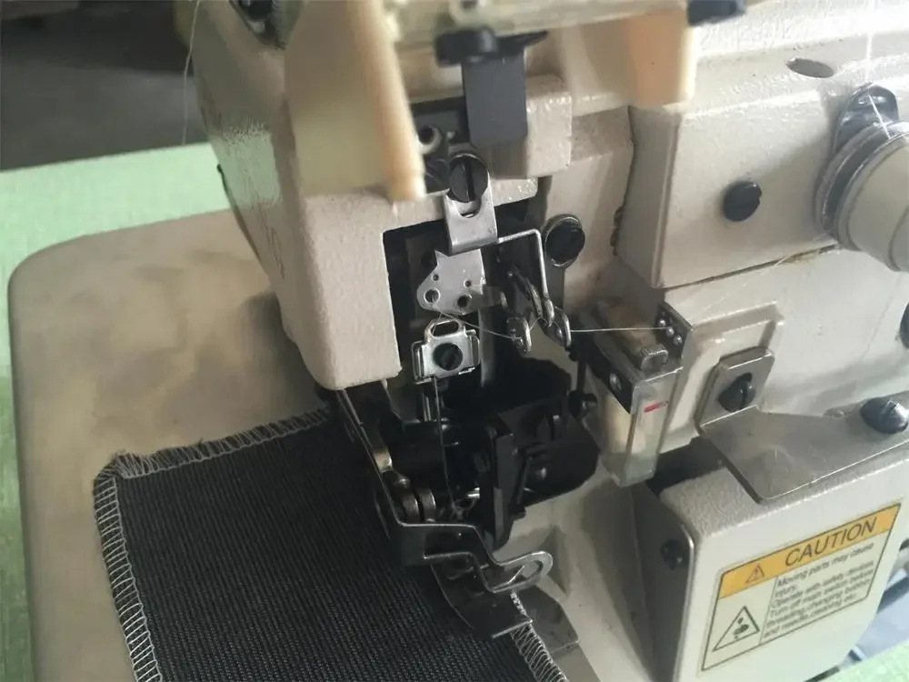 JN-747 High Speed 4 Thread Flat Bed Overlock Industrial Sewing Machine