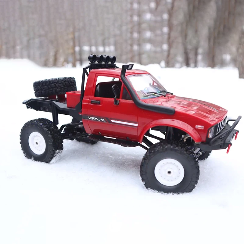 Pack complet du buggy RC pas cher : voiture RC 1/16 4CH 2.4GHz tout terrain C-14 avec télécommande et batterie.