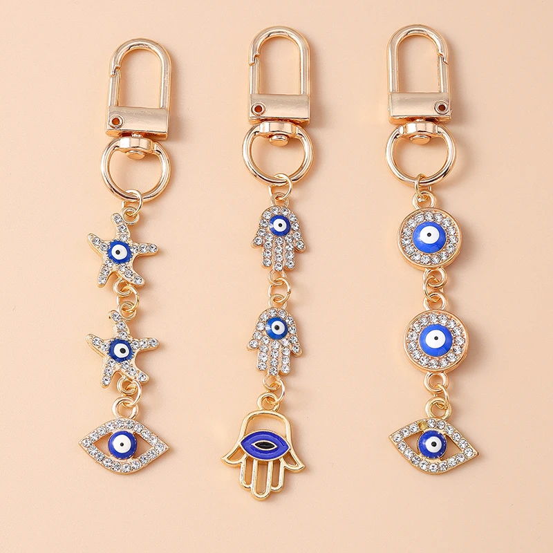 Nette Kristall Evil Eye Hand Seestern Schlüsselbund für Auto Schlüssel Frauen Mädchen Handtasche Anhänger Schlüsselanhänger Zubehör DIY Schmuck Decora