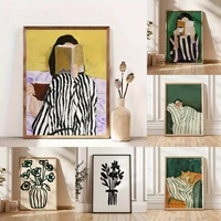 บทคัดย่อผู้หญิงอ่านหนังสือและเครื่องดื่มกาแฟผ้าใบพิมพ์สีเขียวลายผู้หญิง Wall Art โปสเตอร์สําหรับห้องนั่งเล่นตกแต่งบ้าน 1