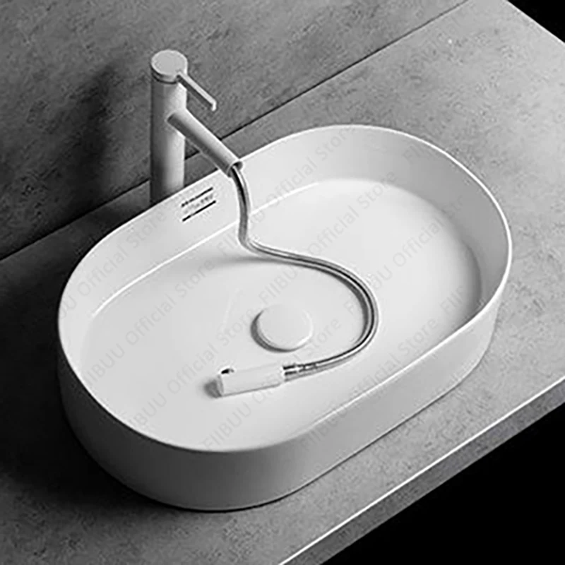 เซรามิคสีขาวอ่างล้างจานเหนือเคาน์เตอร์โมเดิร์นรูปไข่อ่างล้างจานห้องน้ํา Washroom และระเบียงศิลปะอ่างล้างหน้าสําหรับ Home Office Use 1