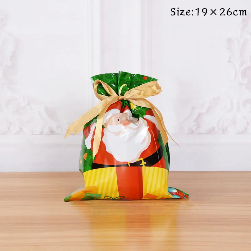 thumbnail image 1 of Bolsas de regalo navideñas con cordón de 42/31 cm, diseño de Papá Noel, grandes, doradas y plateadas, para galletas, dulces, para Navidad, 5 unidades, 1 of 5