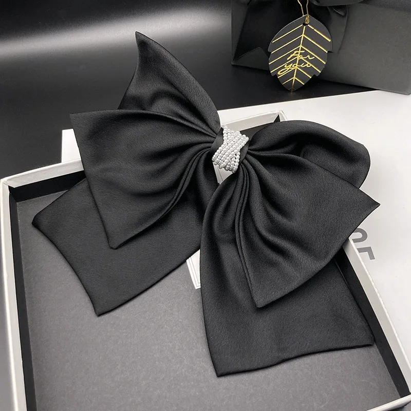 

Высококачественная простая однотонная заколка для волос в стиле интернет-знаменитостей для женщин, новинка 2023, весенний зажим, черный атласный головной убор с бантом