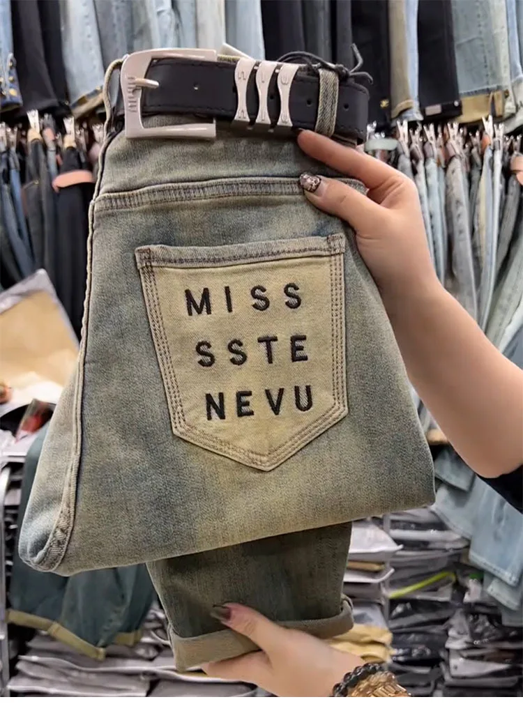 Close up of button and fake zipper decorations