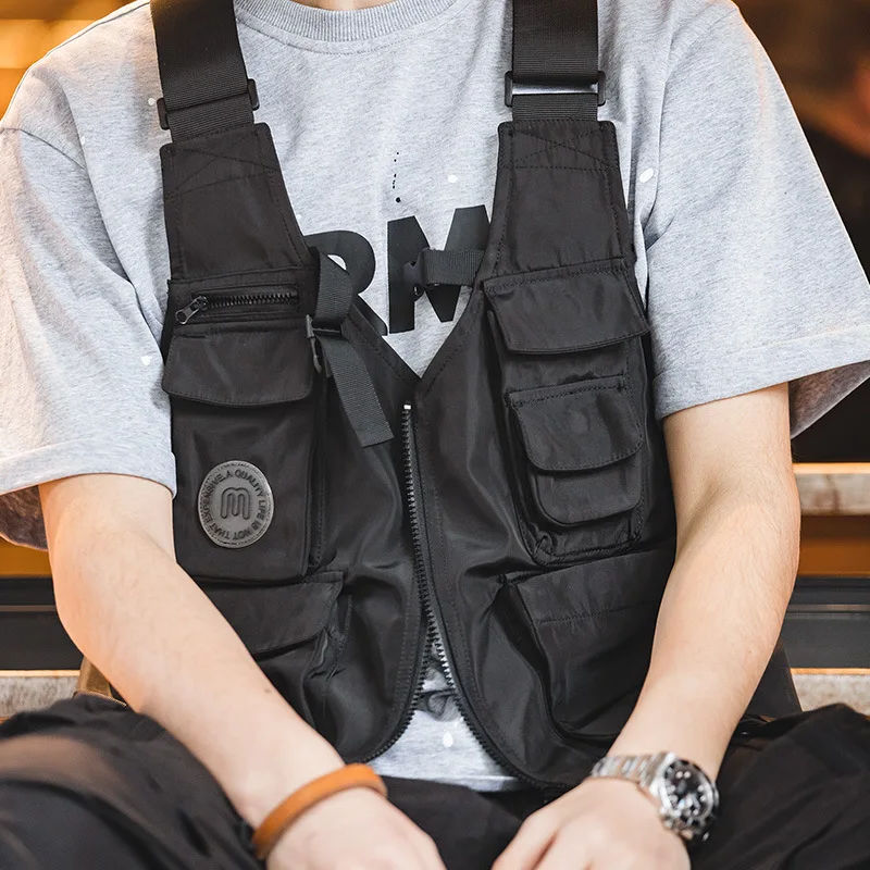 Veste tactique pêche multi-poches avec sac solide et bretelles larges pour équipement