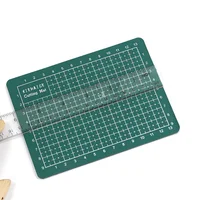 4 colorxiehaige 15*11Double-Sided PVC A6 Cutting Mat Multipurpose Self Healing Cutting Mats for Durable Paper Mat for Cutting 5