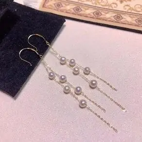 

Серьги-кисточки из розового золота, с натуральным пресноводным жемчугом