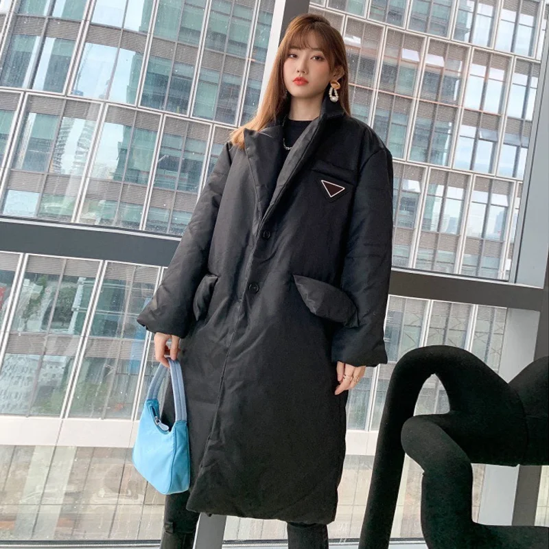 

Autumn And Winter Cotton Clothes Fashion Triangle Decoration Thickened Warm Nylon Mid Length Belt Cotton Clothes Women's Coat