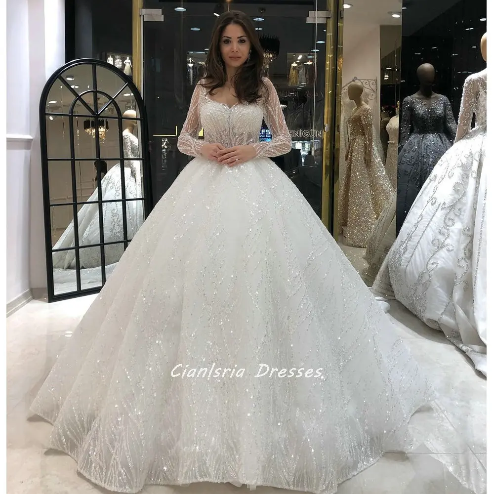 

Shiny Crystal Beading Long Train Dubai Ball Gown Wedding Dress Scoop Illusion Full Sleeve Sequined Saudi Arabic Bridal Gown