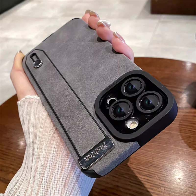 thumbnail image 1 of Luxury Suede Fur Leather Wrist Strap Holder Soft TPU Phone Case For iPhone 15 11 12 13 14 Pro Max 15Plus Shockproof Bumper Cover, 1 of 5
