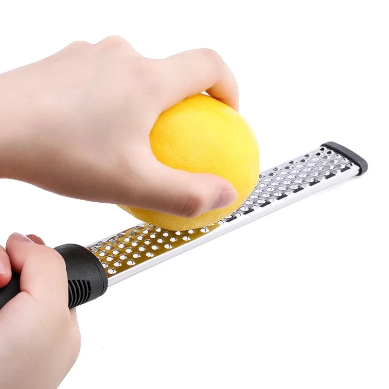 Stainless Steel kitchen Fruit Vegetable Tool Lemon Zester Cheese And Spice Grater Peeling Stripping machine With Non-Slip Handle