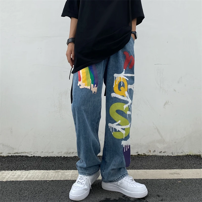 Street Harajuku Graffiti Hip Hop Jeans Men And Women Loose Wide Legs Straight Pants Four Seasons Casual Fashion Denim Clothing new goth pants graffiti smiling face print baggy jeans women straight loose american couples street y2k high waist slouchy jeans