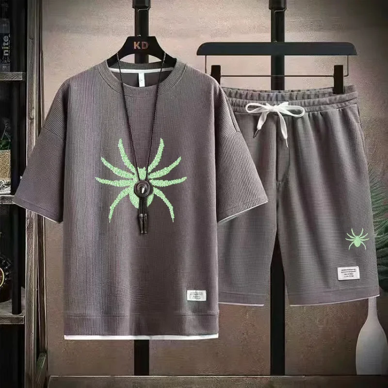thumbnail image 1 of Conjunto deportivo informal de marca de moda de verano para hombre con pantalones cortos holgados de manga corta y cuello redondo, conjunto de dos piezas con diseño de gofre, conjunto de versión corea, 1 of 5
