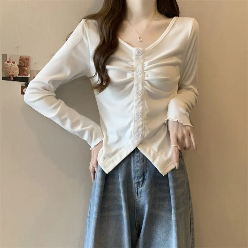 T-shirt nuovo stile Top irregolare a maniche lunghe per l'autunno 1