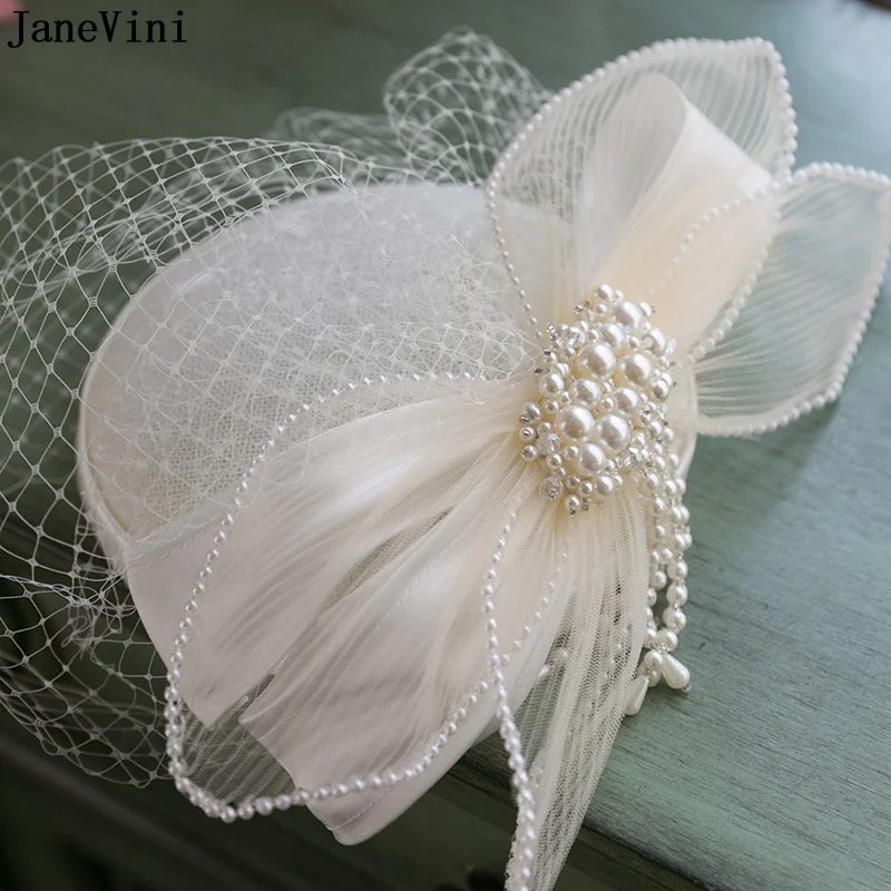 JaneVini Elegant White Wedding Hat with Hair Pins and Clips Pearl Bow Mesh Face Veil Bridal Hats Party Cocktail Hair Accessories janevini vintage women lace wedding hat flowers mesh face veil pearl fascinator wedding party bride hats accessoir de mariage