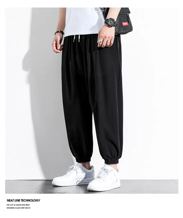 Casual pants men's spring 2022 new joggers sweatpants loose wide leg handsome nylon nine point tide brand legged ice silk pants Sweatpants