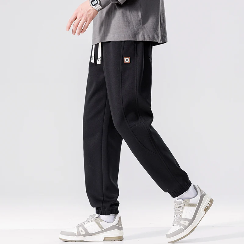 Spring Autumn New Solid Color Fashion Elastic Waist Sweatpants Man High Street Casual Loose Pockets Drawstring Cotton Trousers