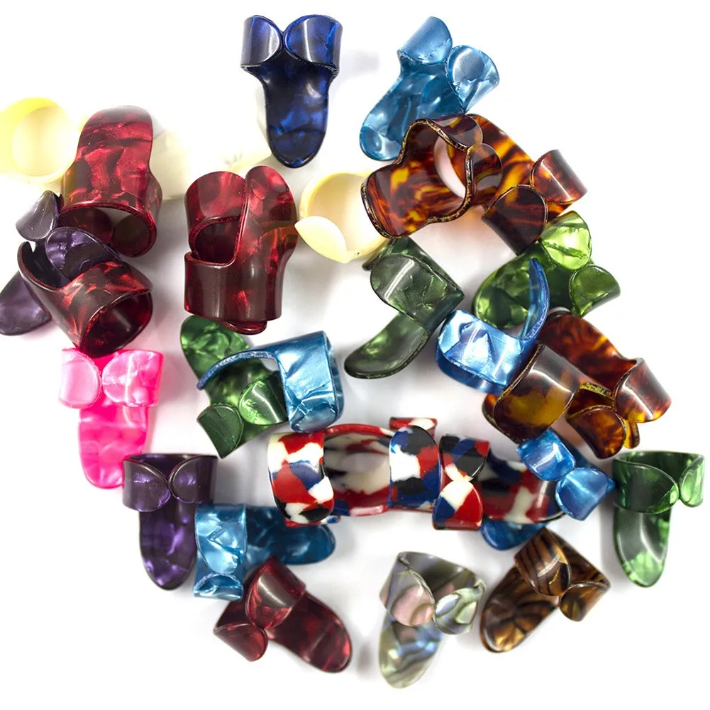 

Прочный высококачественный Лидер продаж Новый практичный большой палец Ретро музыкальная часть случайный цвет Запасной 4 шт. целлулоидный классический