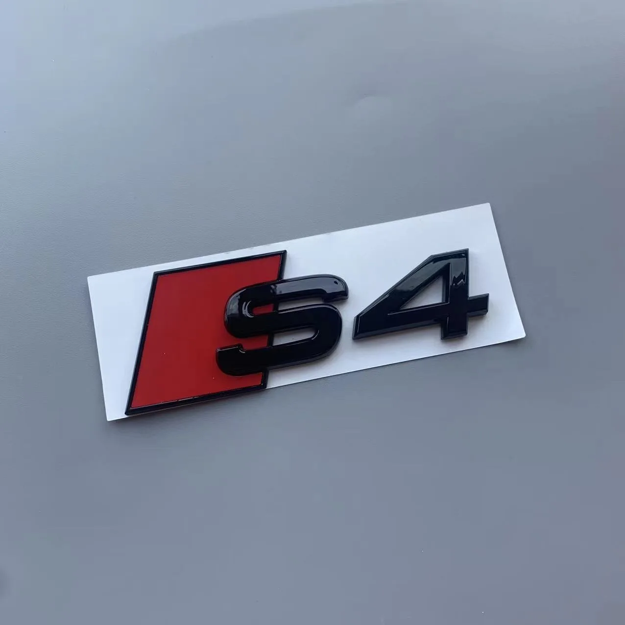 AUDI S4 2020-2024 4 링 로고 ABS 블랙 자동차 후드 전면 그릴 엠블럼 후면 트렁크 배지 스티커 S4 엠블럼 V6T 스티커 액세서리
