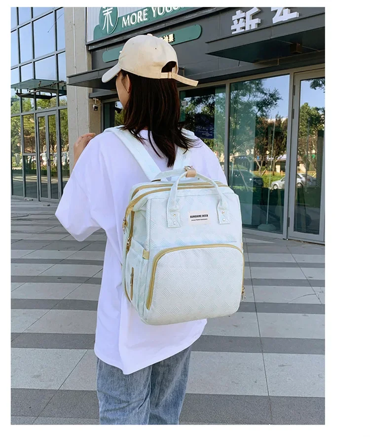sac à langer avec lit