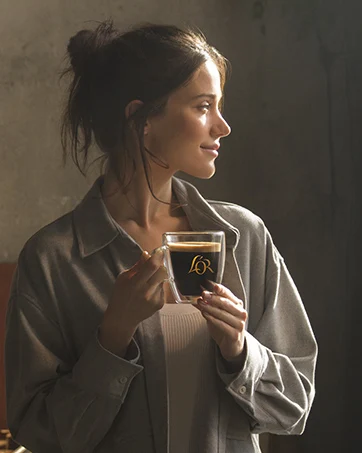 woman sipping coffee