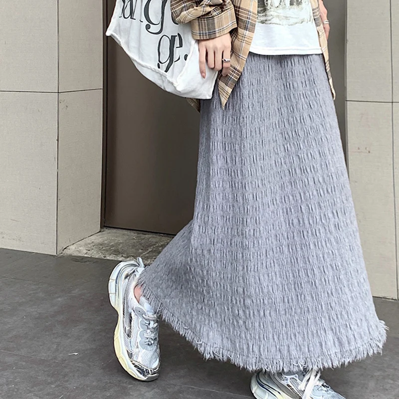 Elegant High-Waisted A-Line Skirt with Raw Edged Folds
