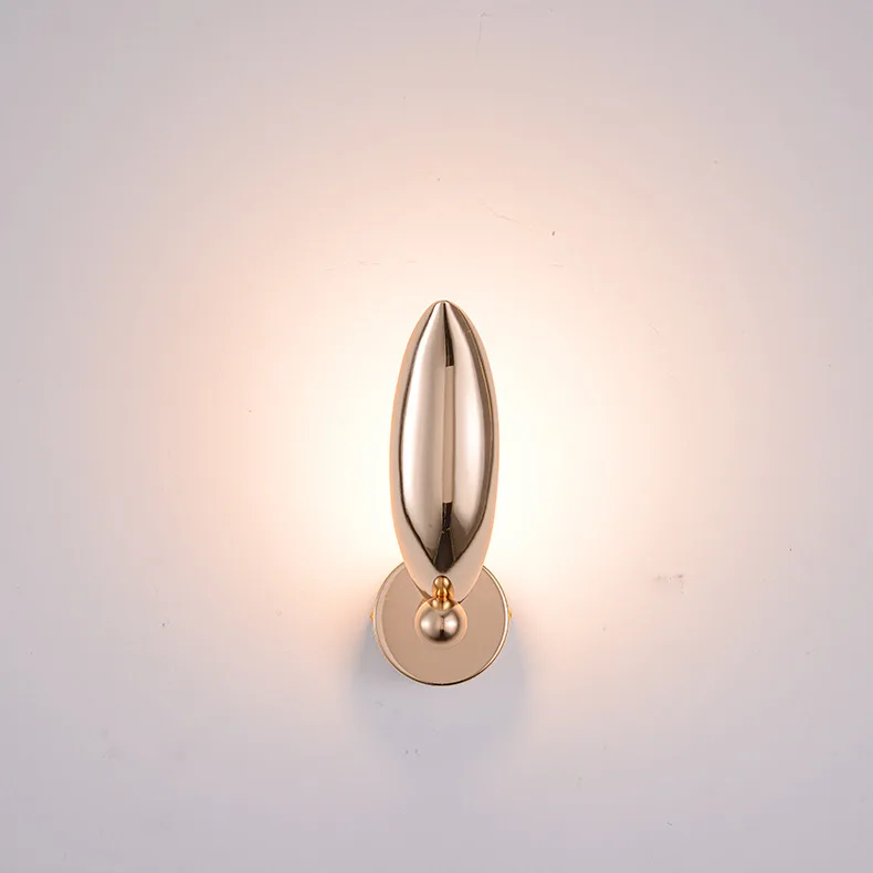 The Flying Bird Wall Light combines modern design with a touch of luxury, featuring a gold plated finish that beautifully stands out against a clean white background. Perfect for adding elegance to any interior space.