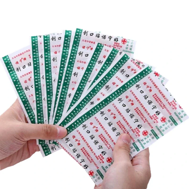 

50pcs/set Breathable Band Aid Breathable Adhesive Bandages Waterproof First Aid Strips Wound Plaster Dressing Patch Woundplast