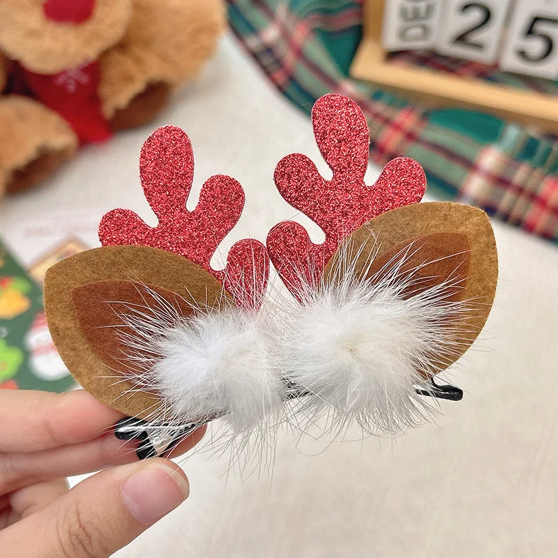 Pink antler pom-pom alligator hair clip